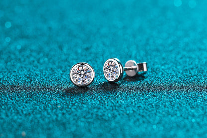 Bezel solitaire studs, close up